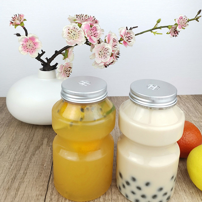 500ml食品等級の使い捨て可能な飲むことはリング バケツの形、明確なプラスチックびん/帽子が付いている貯蔵容器をびん詰めにする